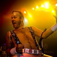 'Big Rig' shows off his best riff in spangly pink pants.